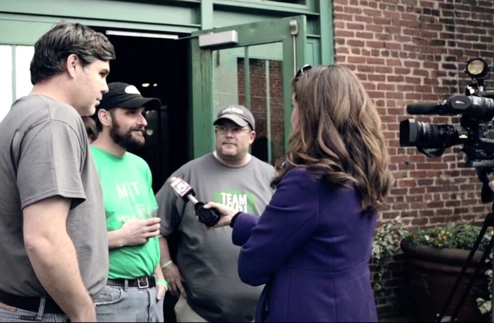 Giving Kitchen founders interviewed by a news channel